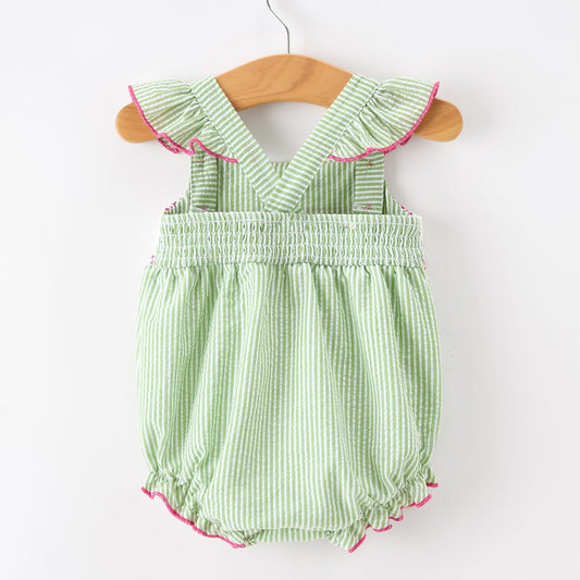 Back of Green striped western boots and cactus baby romper with pink accents on a white background