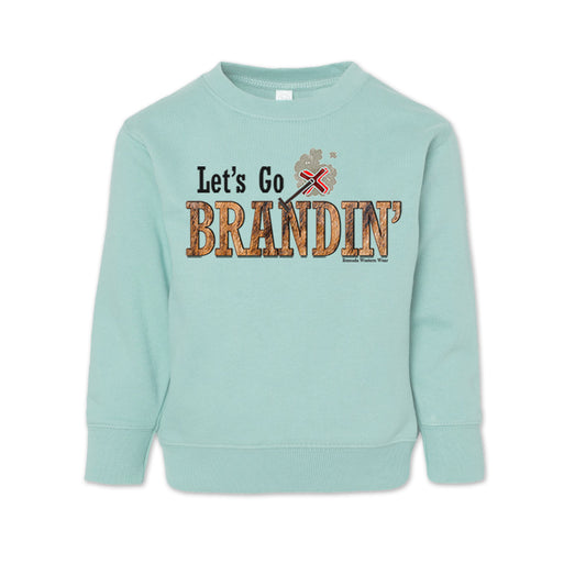 A toddler vintage chill light blue green colored sweatshirt with the phrase 'Let's Go Brandin'' printed in bold western letters across the chest. Above the text is an illustration of a classic western-style branding iron, emitting a faint glow of heat. The branding iron features a distinctive 'X' emblem, reminiscent of cattle branding. A great shirt for western wear, ranch wear, or rodeo wear.