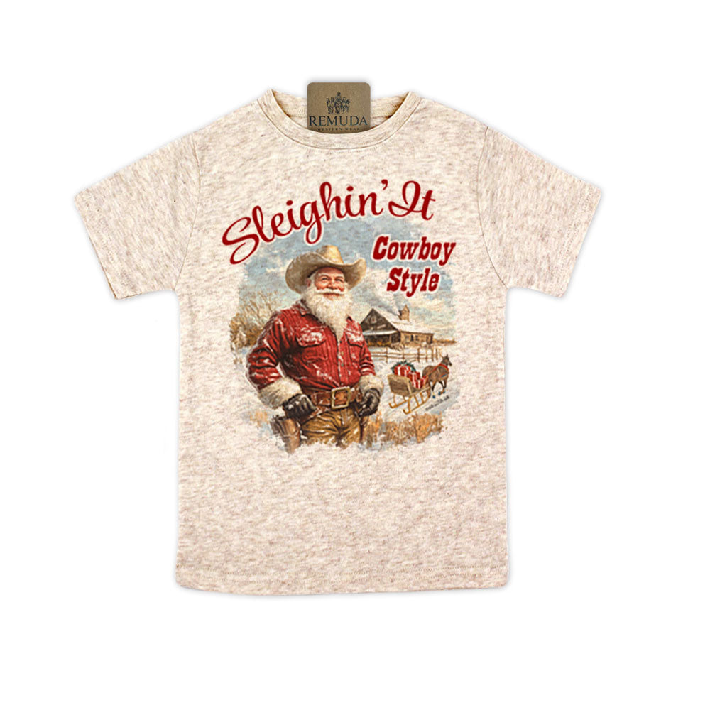 Sleighin It Cowboy Style Christmas Santa Toddler Western Short Sleeve Tee in the color Oatmeal