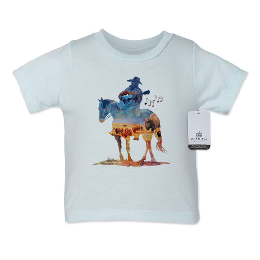 Watercolor-style western illustration on an infant light blue color t-shirt featuring a cowboy on horseback playing a guitar, with a soft, artistic “Where The Buffalo Roam” overlay design.