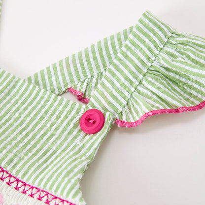Green and white striped dress with pink trim and button on a white background