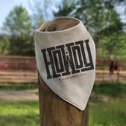 Say 'Howdy' to mess-free meals with our oatmeal color infant bandana style western bib. Perfect for your little cowboy or cowgirl.