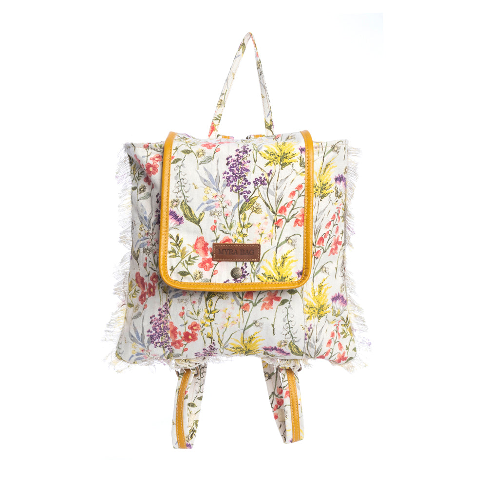 Floral-patterned backpack with yellow accents on a white background