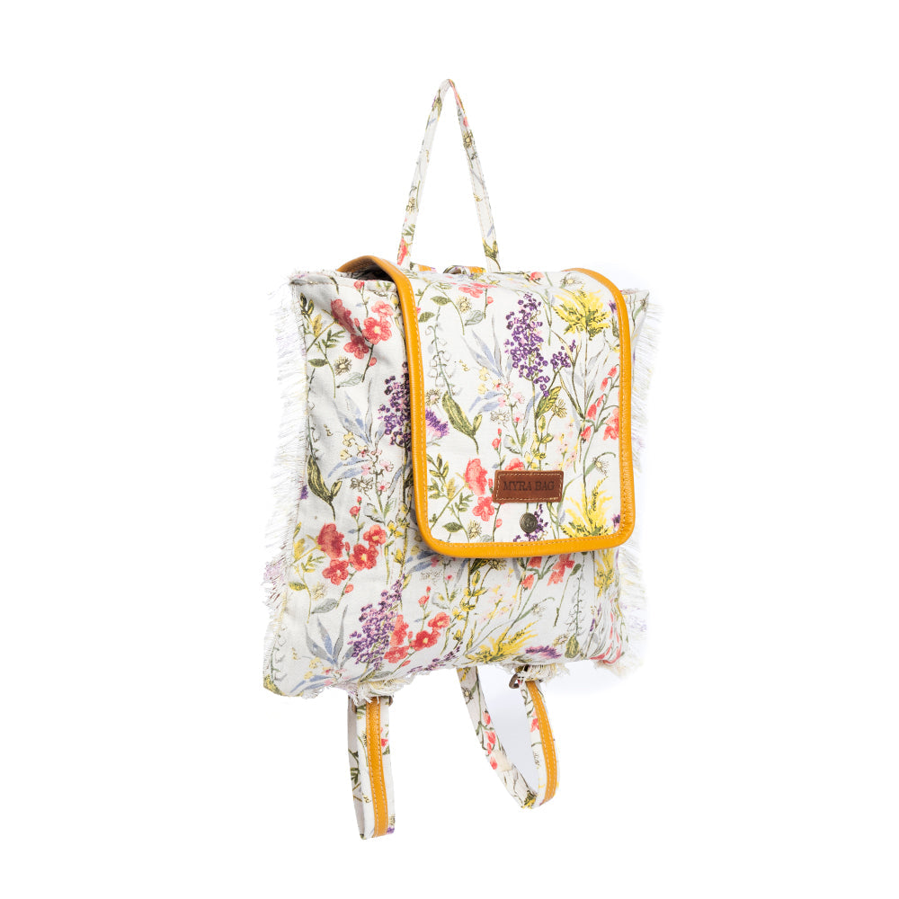 Floral-patterned backpack with leather accents on a white background
