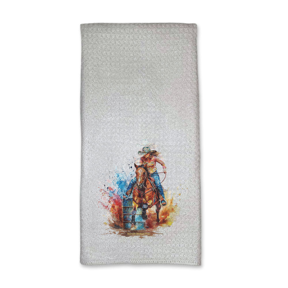 A set of vibrant western rodeo style kitchen hand towels featuring a barrel racer running around a barrel. Comes in a white color. The design captures the spirit of rodeo and western culture.