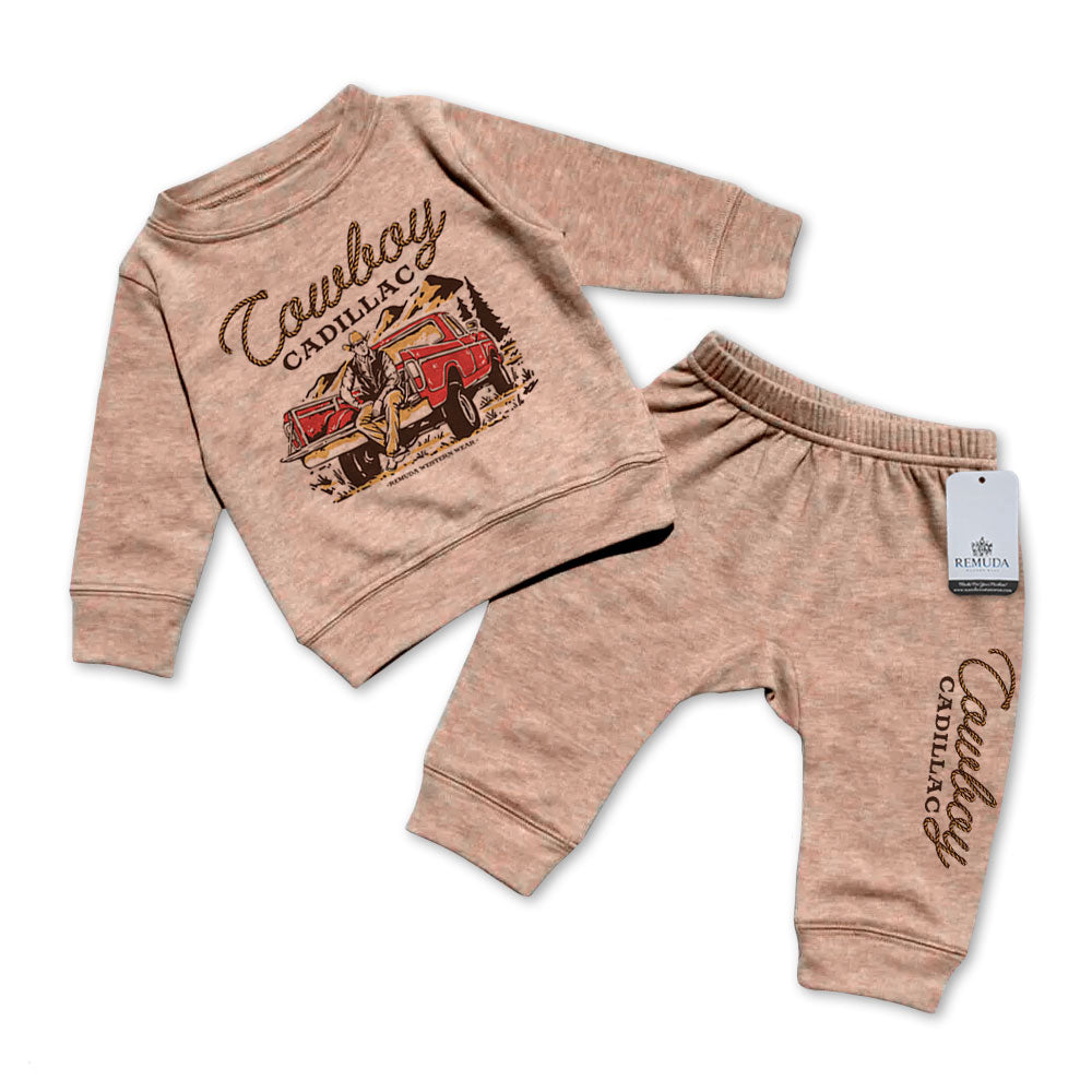 A custom two-piece infant sweatsuit featuring “Cowboy Cadillac” western graphic sweatshirt and matching jogger pants by Remuda Western Wear in Sandstone color.
