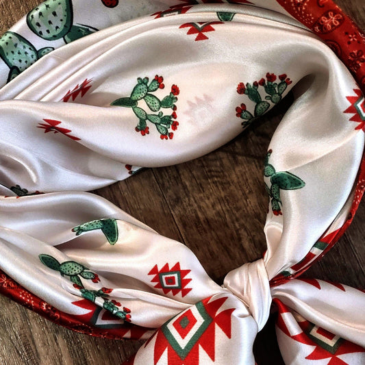 Wild Rag 100% Silk Cactus Red Bandana Border Cowboy Western Neck Scarf with Teal Green and Red colors. An exclusive design by Double B Wild Rags. Cactus, Aztec motif, with a classic red bandana border close-up.