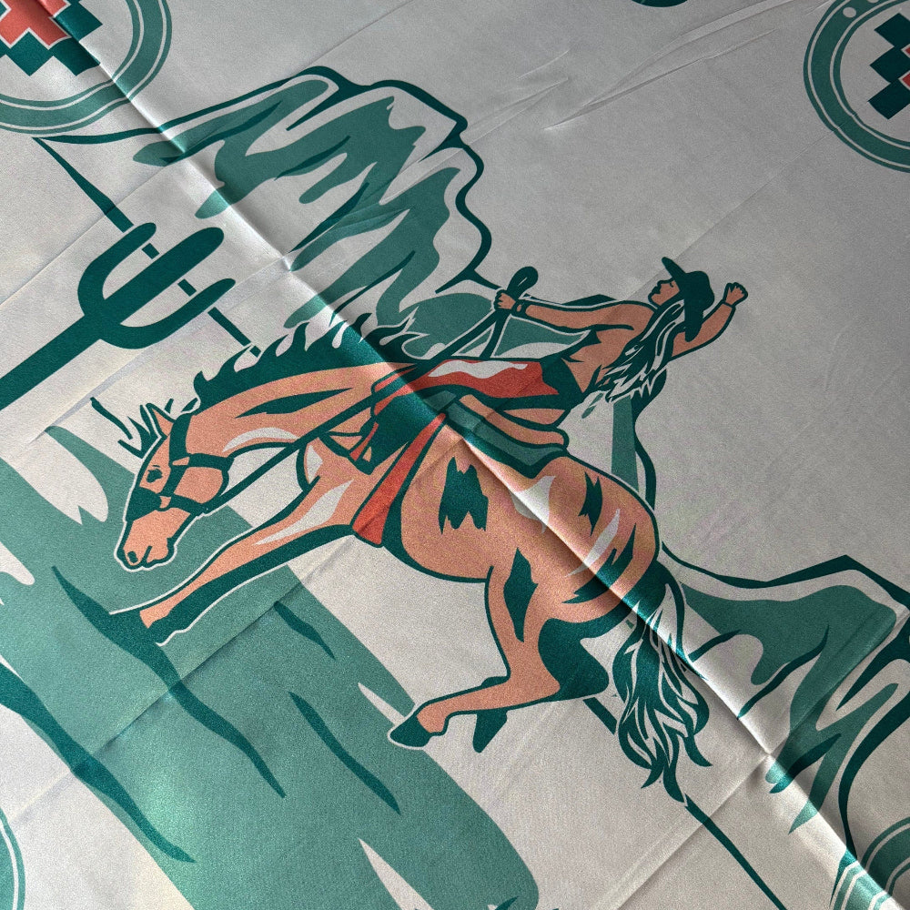 Close-up of Wild Rag 100% SILK Desert Cowgirl Cactus Cowboy Neck Scarf Bandana Double B Ivory White, light teal blue, coral pink.