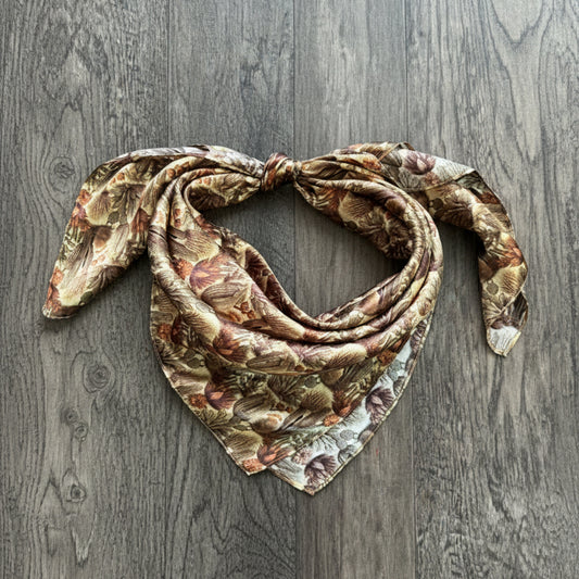 100% Silk Wild Rag Cactus with Neutral tones of beige tan, dark sage green, and light rust orange.