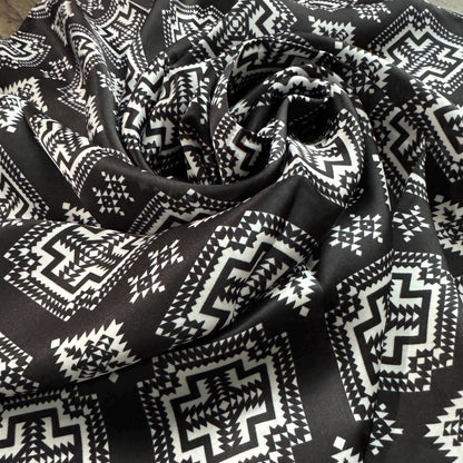 Close-up of 100% Silk Wild Rag Black White Native Tribal Neck Scarf Double B Black and White tribal inspired print