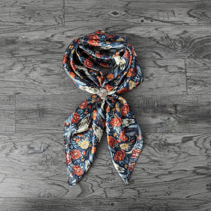 A Wild Rag with Navy Blue, Ivory, Rust Orange and Red, and Sage Floral Patterns Creative