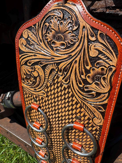 A Genuine Western Tooled Leather Floral Basketweave Wild Rag Scarf Display Holder Keeper Close up view 