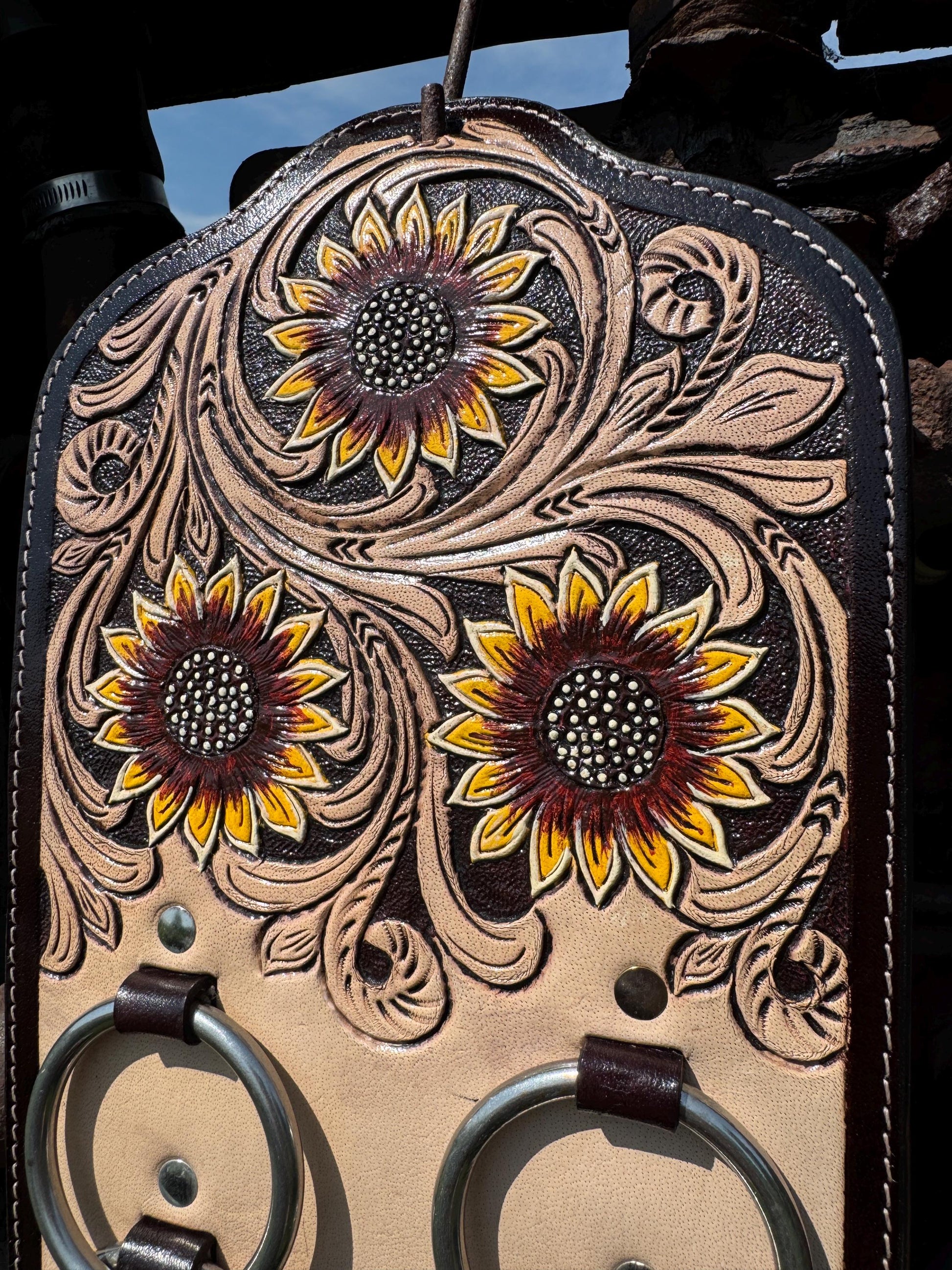 A Genuine Western Tooled Leather Floral Yellow Sunflower Wild Rag Scarf Display Holder Keeper Close up view 