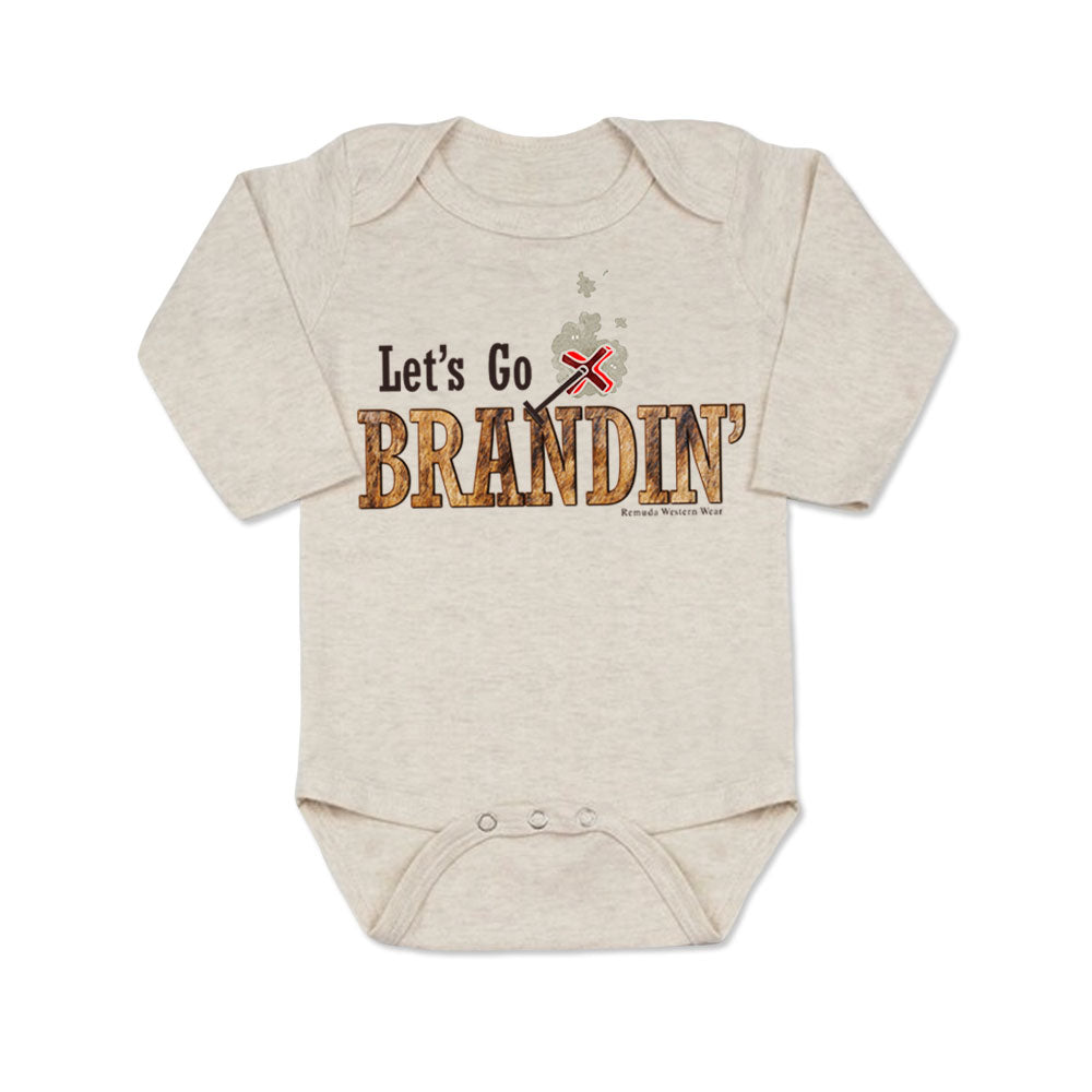 A stylish western-themed oatmeal colored infant long sleeve one piece romper bodysuit featuring the phrase 'Let's Go Brandin'' prominently printed in bold, weathered letters across the chest. Above the shirt is is an illustration of a branding iron, evoking a rustic cowboy aesthetic. Kids Western wear, Ranch wear and Rodeo wear.