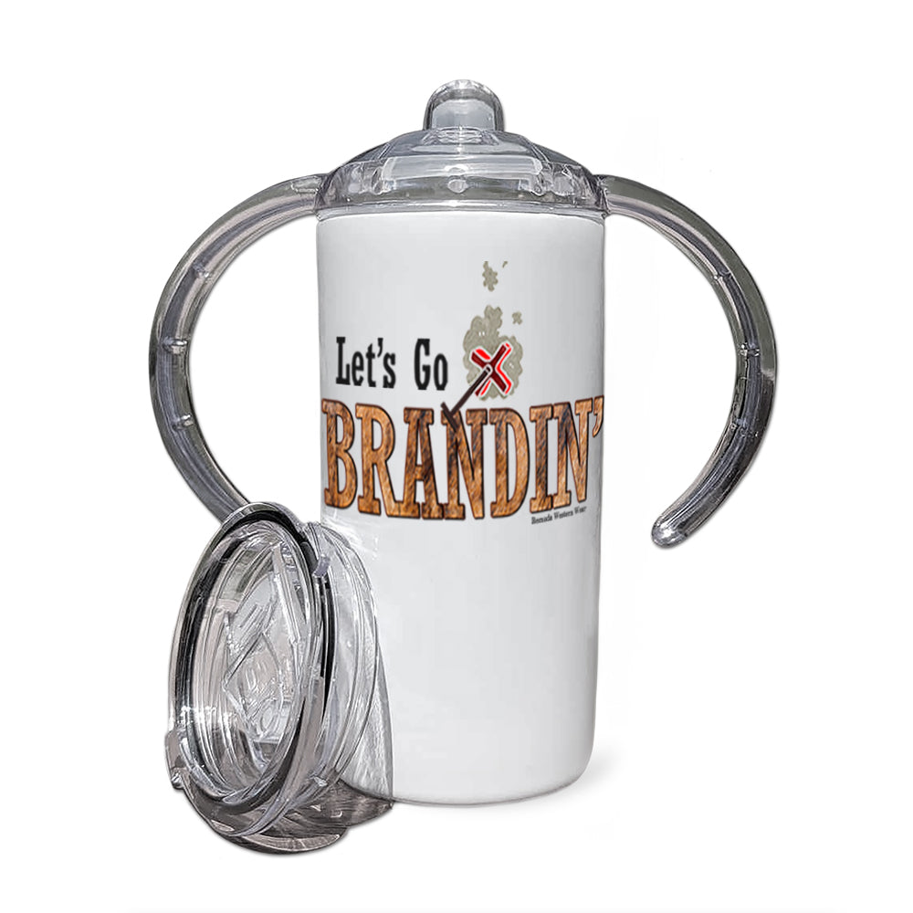 A children's sippy cup tumbler with a western theme, featuring the phrase 'Let's Go Brandin'' printed in playful, colorful letters on the front. Above the text is an illustration of a small branding iron, reminiscent of those used in the Old West. The branding iron emits a gentle glow, adding a whimsical touch to the design.