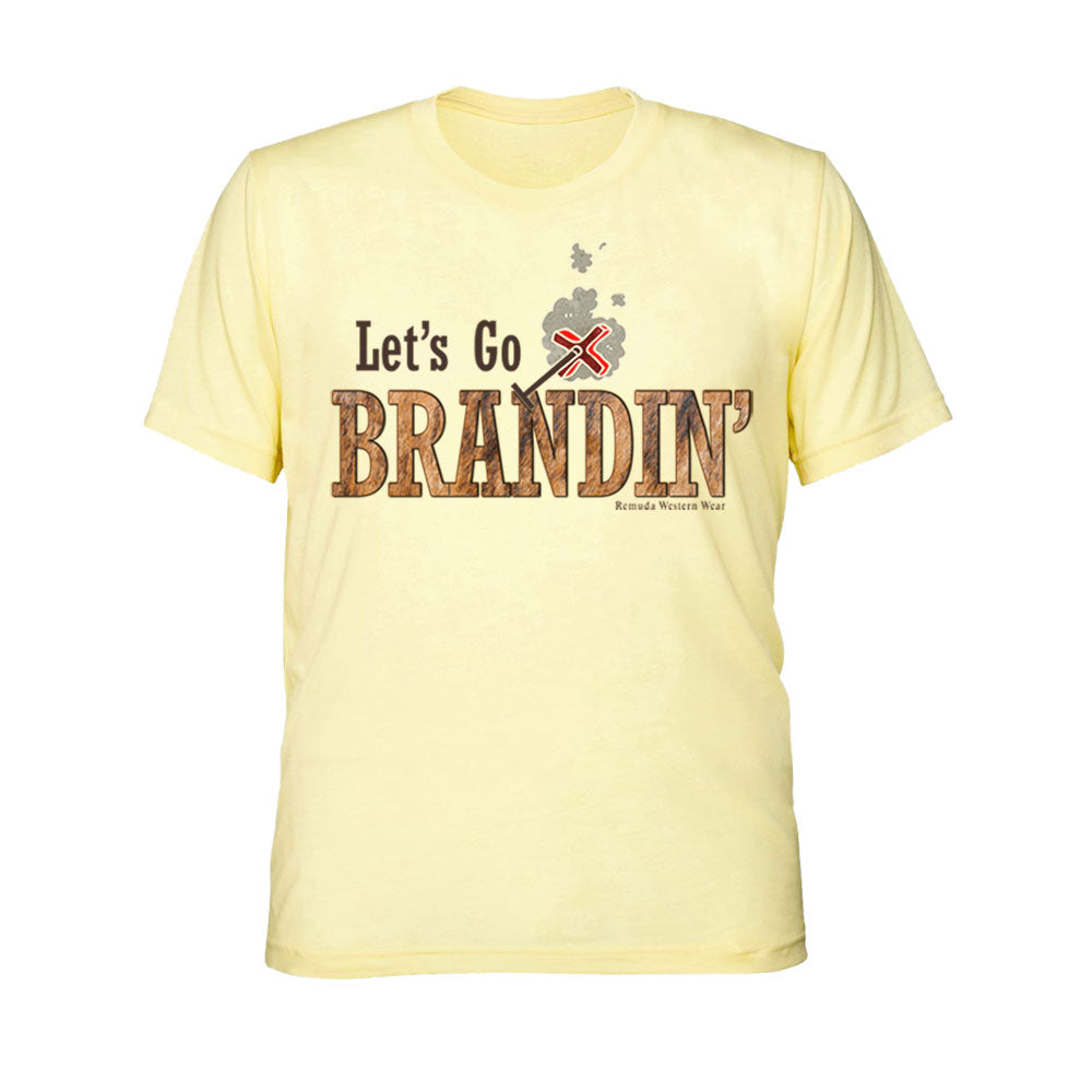 A stylish western-themed light yellow colored adult-shirt featuring the phrase 'Let's Go Brandin'' prominently printed in bold, weathered letters across the chest. Above the shirt is is an illustration of a branding iron, evoking a rustic cowboy aesthetic. Western wear, Ranch wear and Rodeo wear.