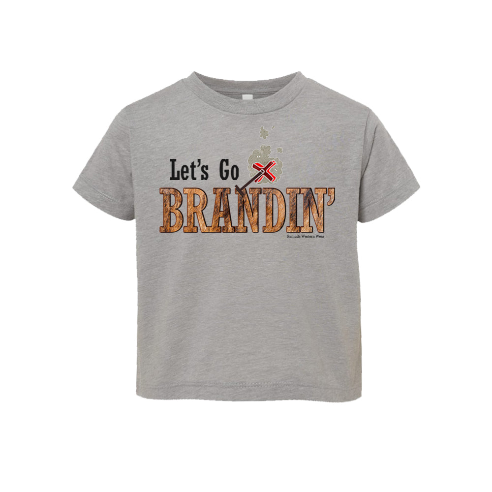 A stylish western-themed athletic gray colored toddler t-shirt featuring the phrase 'Let's Go Brandin'' prominently printed in bold, weathered letters across the chest. Above the shirt is is an illustration of a branding iron, evoking a rustic cowboy aesthetic. Kids Western wear, Ranch wear and Rodeo wear.