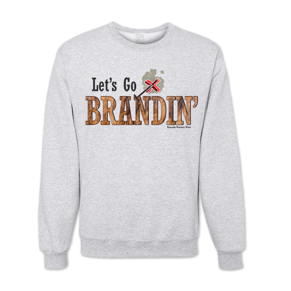 An adult vintage light ash gray colored sweatshirt with the phrase 'Let's Go Brandin'' printed in bold western letters across the chest. Above the text is an illustration of a classic western-style branding iron, emitting a faint glow of heat. The branding iron features a distinctive 'X' emblem, reminiscent of cattle branding. A great shirt for western wear, ranch wear, or rodeo wear.