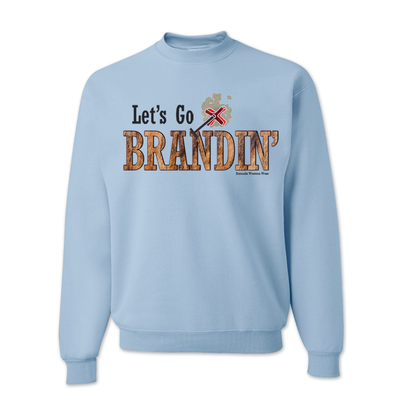 An adult vintage light blue colored sweatshirt with the phrase 'Let's Go Brandin'' printed in bold western letters across the chest. Above the text is an illustration of a classic western-style branding iron, emitting a faint glow of heat. The branding iron features a distinctive 'X' emblem, reminiscent of cattle branding. A great shirt for western wear, ranch wear, or rodeo wear.