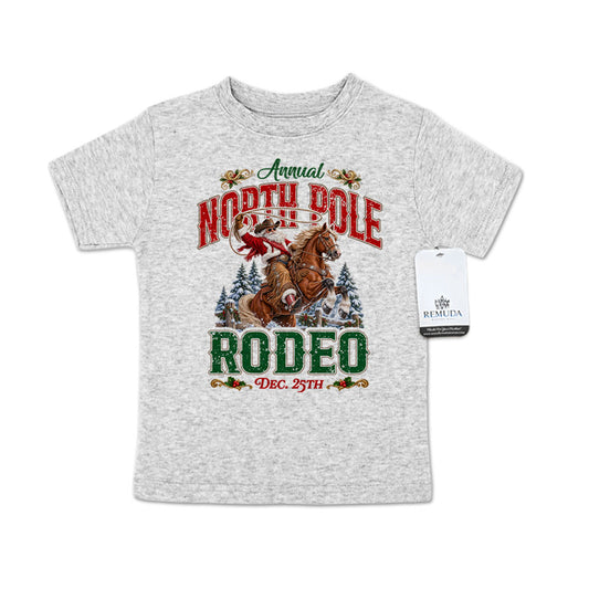 Heather gray toddler short sleeve T-shirt featuring a festive North Pole Rodeo Christmas design with Cowboy Santa riding a rearing horse, snowy pine trees, vintage red and green rodeo lettering, and December 25th details.