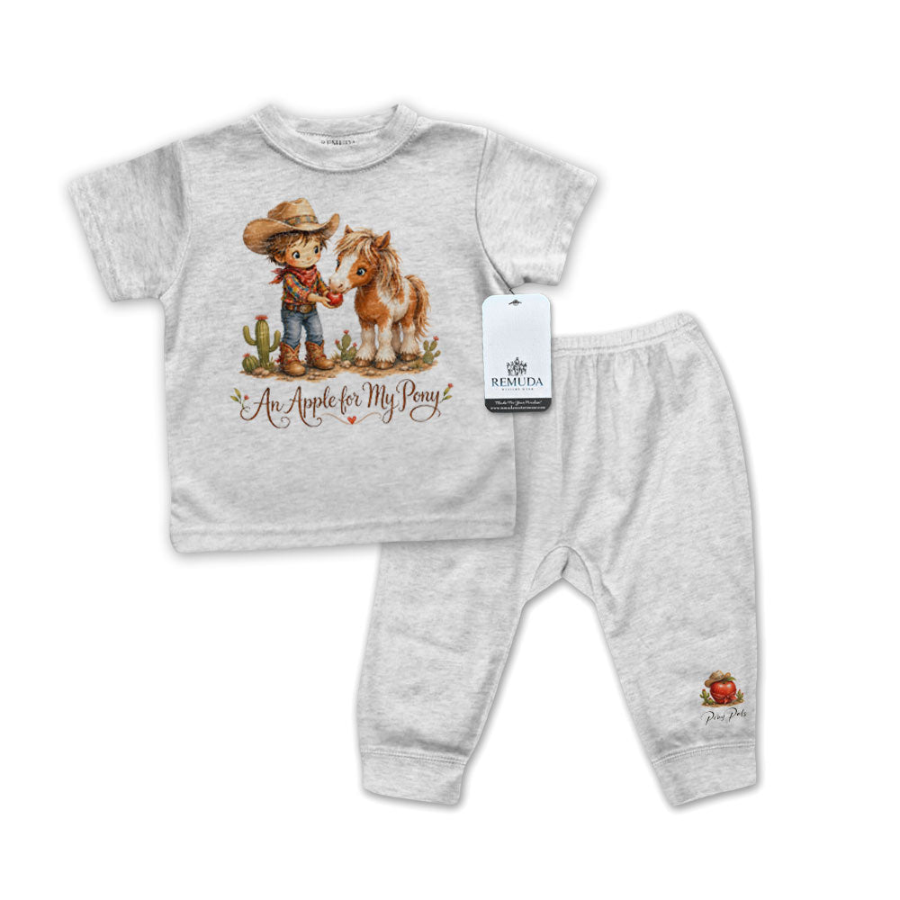 Gray baby short sleeve pajama outfit with cowboy and horse design on shirt and apple detail on pants visible.