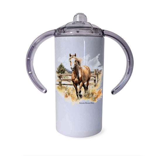 A children's sippy cup tumbler with a western theme, featuring a colorful image of a palomino horse running in 