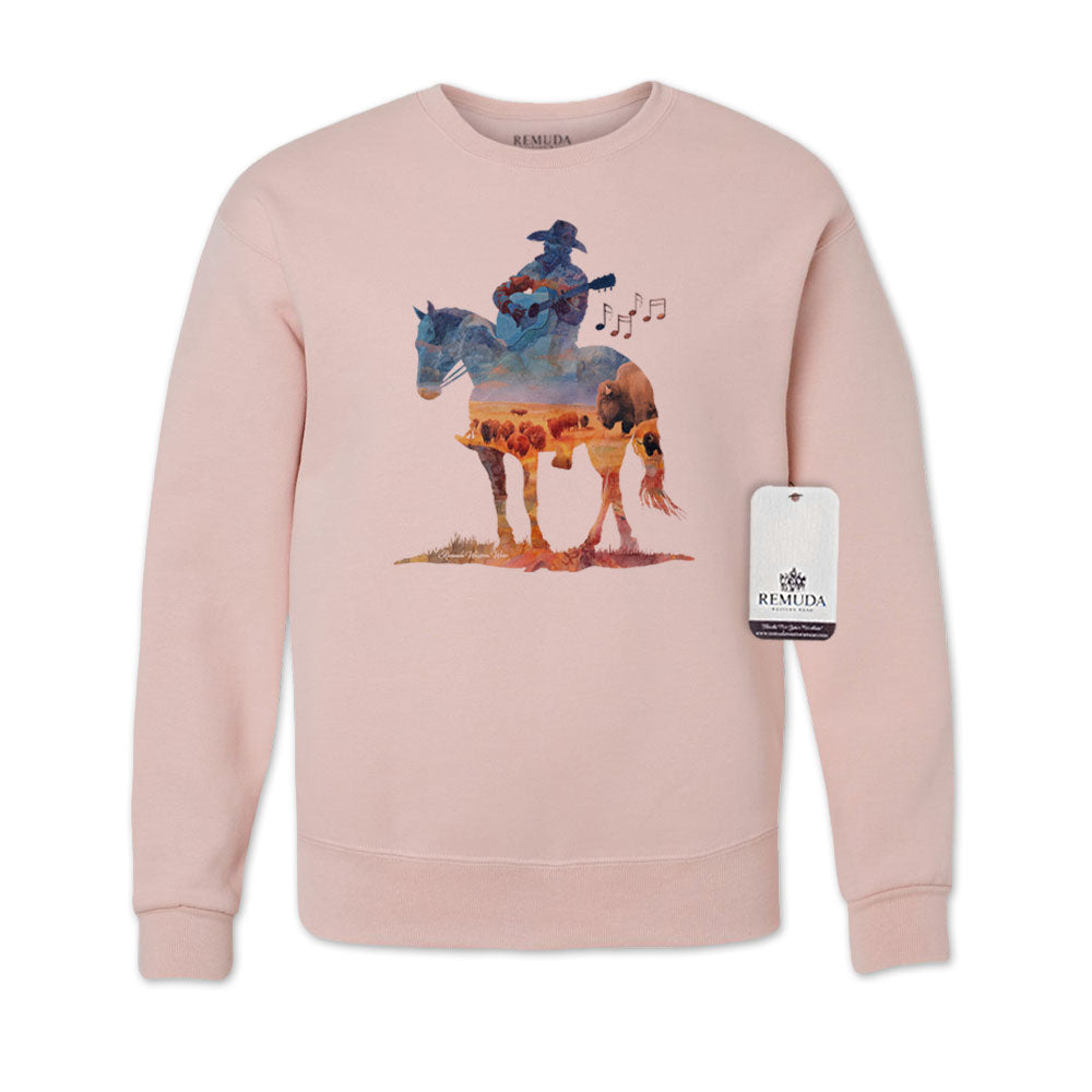 Watercolor illustration of a cowboy riding a horse while playing a guitar, featured on an blush pink unisex Western-style sweatshirt with a soft, artistic design.