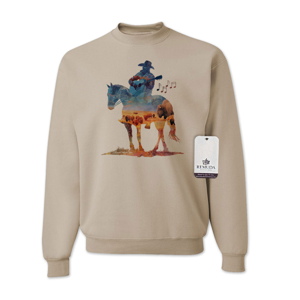 Watercolor illustration of a cowboy riding a horse while playing a guitar, featured on a sandstone colored unisex Western-style sweatshirt with a soft, artistic design.