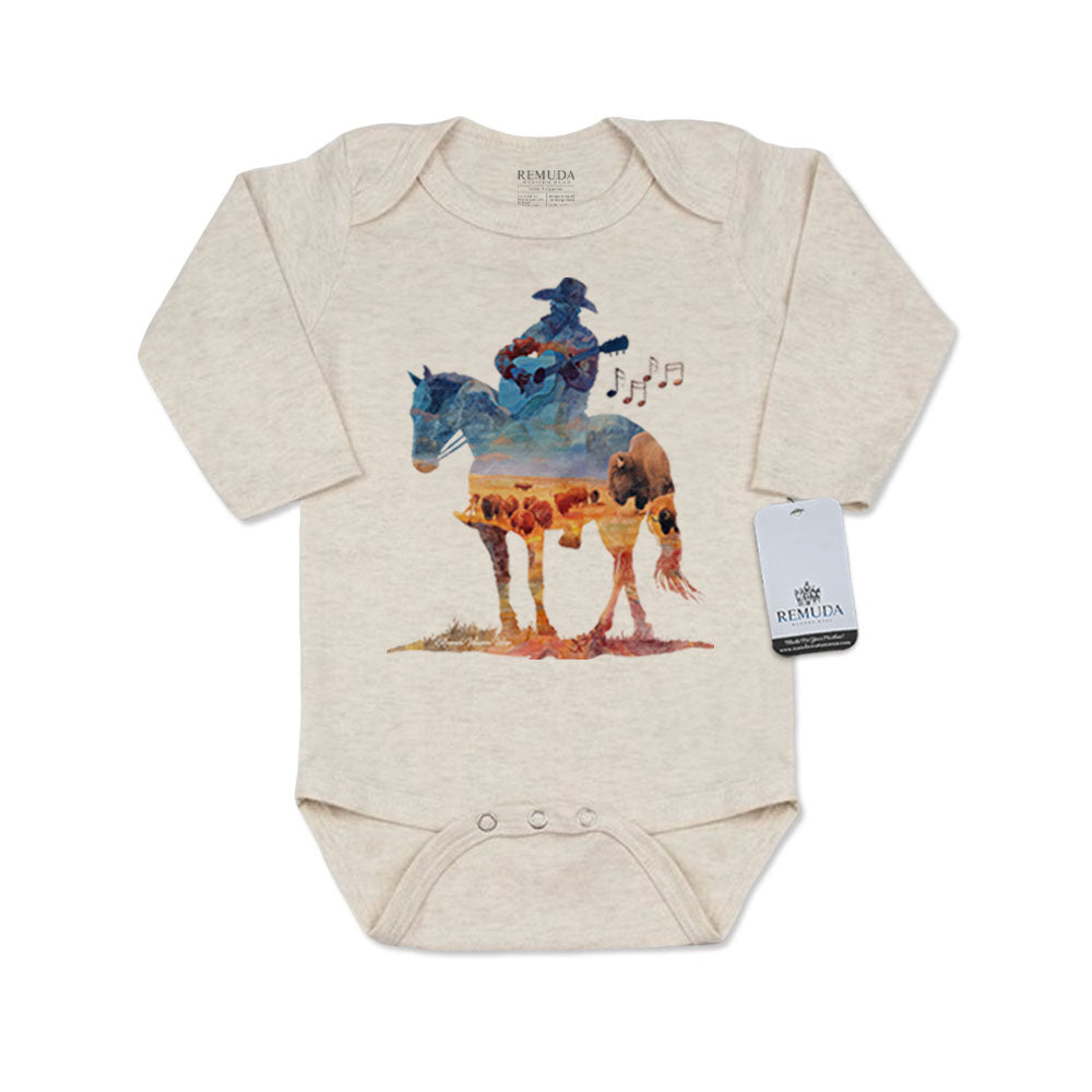 Infant western one piece long sleeve oatmeal romper featuring a watercolor-style illustration of a cowboy on horseback playing a guitar, with a soft, artistic western design.
