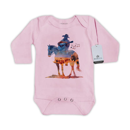 Infant western one piece long sleeve pink romper featuring a watercolor-style illustration of a cowboy on horseback playing a guitar, with a soft, artistic western design.