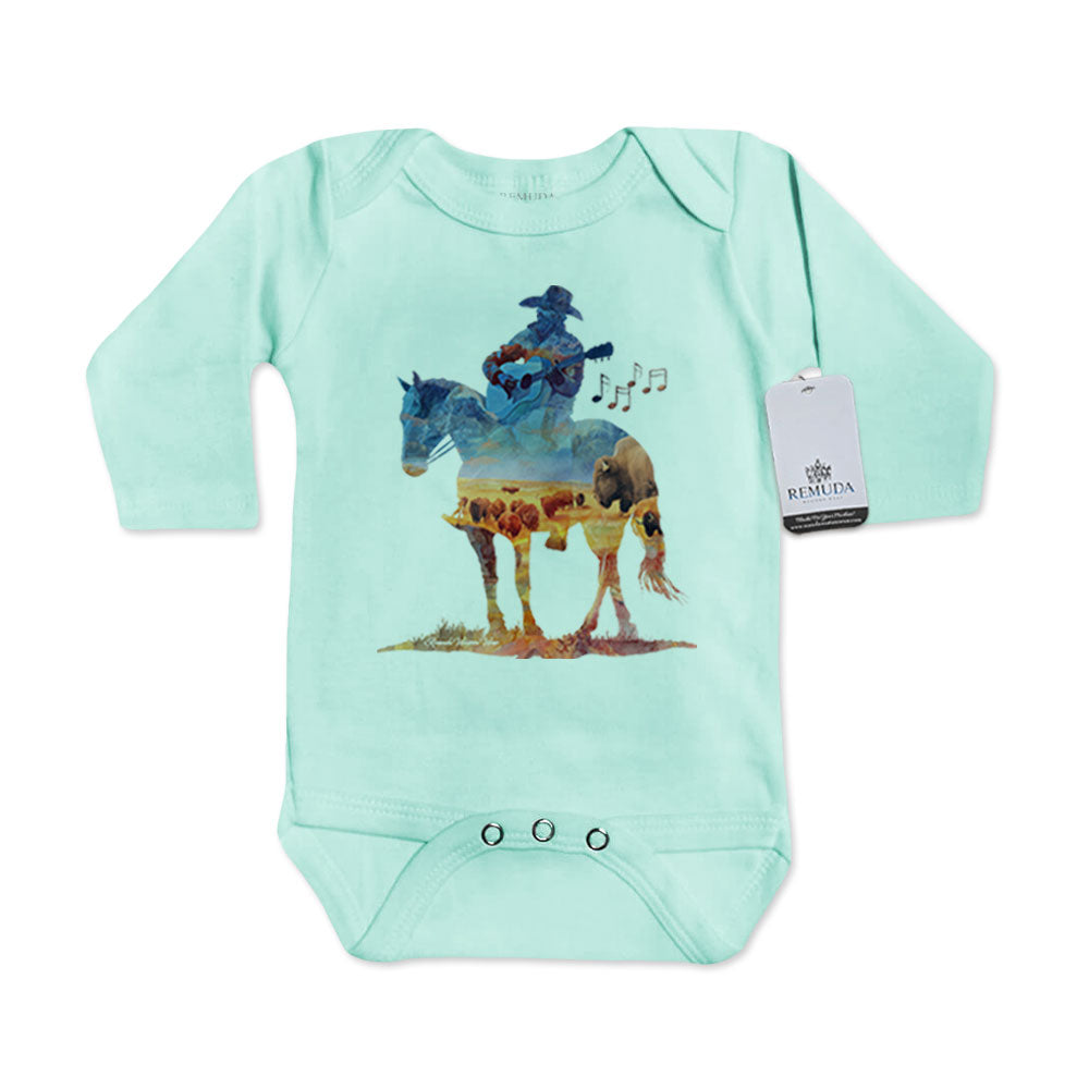 Infant western one piece long sleeve turquoise romper featuring a watercolor-style illustration of a cowboy on horseback playing a guitar, with a soft, artistic western design.