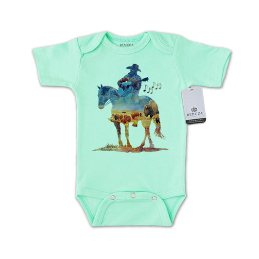 Infant western one piece short sleeve turquoise romper featuring a watercolor-style illustration of a cowboy on horseback playing a guitar, with a soft, artistic western design.