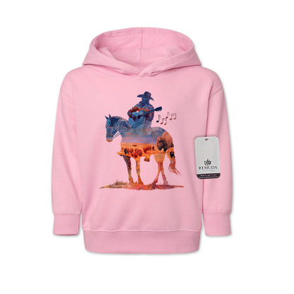 Watercolor-style illustration on a pink toddler pullover hoodie showing a cowboy on horseback playing a guitar, titled “Where The Buffalo Roam,” in a playful western design.