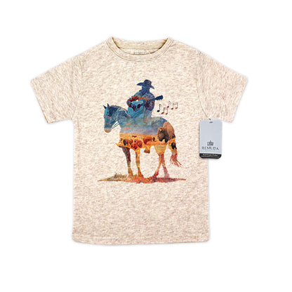 Watercolor-style illustration on an oatmeal toddler t-shirt showing a cowboy on horseback playing a guitar, titled “Where The Buffalo Roam,” with a playful western theme.