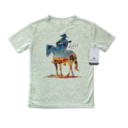 Watercolor-style illustration on a sage green toddler t-shirt showing a cowboy on horseback playing a guitar, titled “Where The Buffalo Roam,” with a playful western theme.