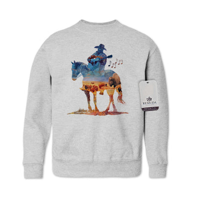 Watercolor-style illustration on an ash gray youth sweatshirt showing a cowboy on horseback playing a guitar, with a playful and artistic western theme titled “Where The Buffalo Roam.”