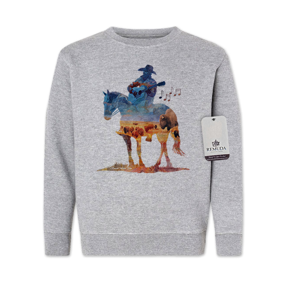 Watercolor-style illustration on a heather gray youth sweatshirt showing a cowboy on horseback playing a guitar, with a playful and artistic western theme titled “Where The Buffalo Roam.”