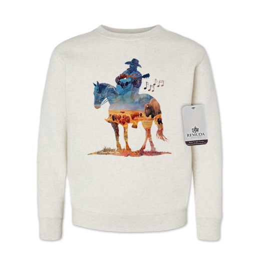 Watercolor-style illustration on an oatmeal youth sweatshirt showing a cowboy on horseback playing a guitar, with a playful and artistic western theme titled “Where The Buffalo Roam.”